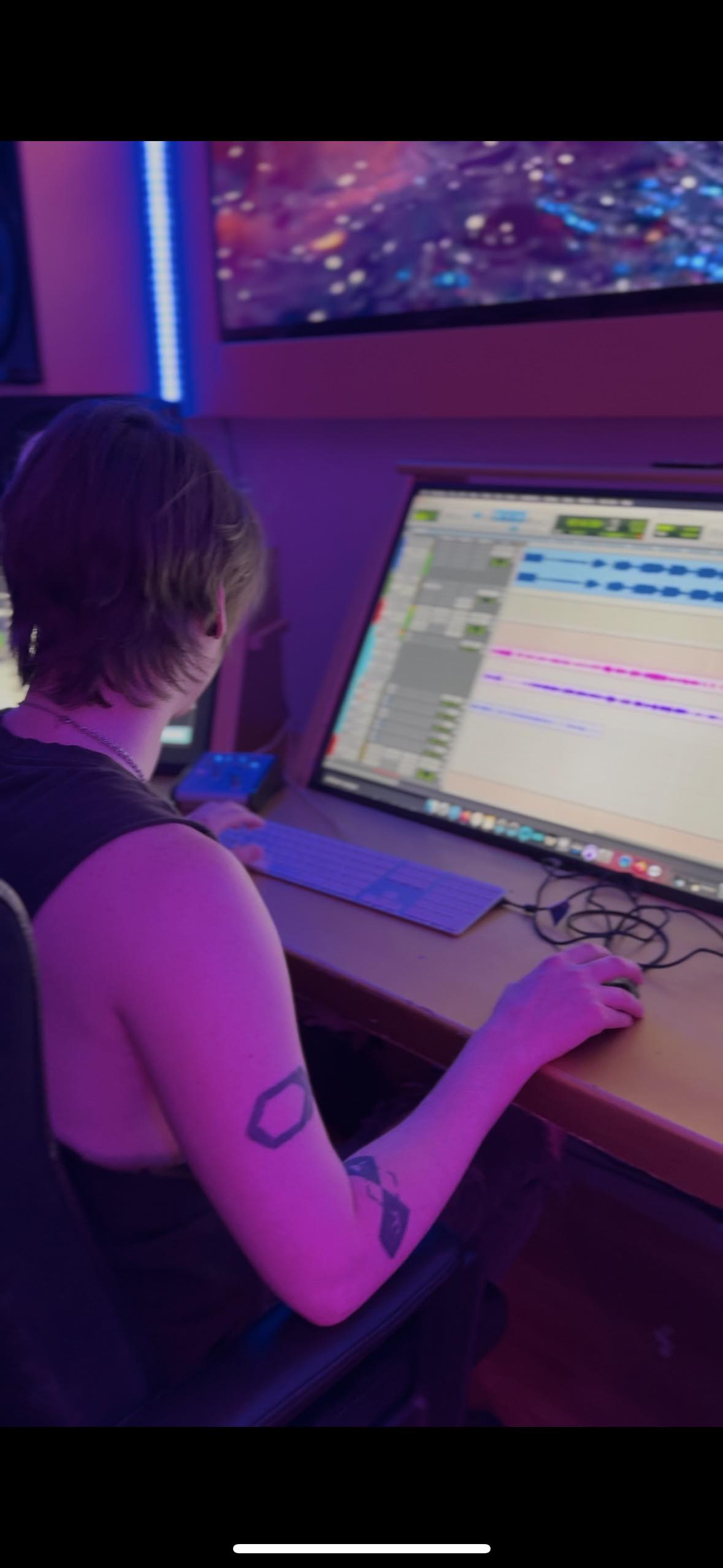 Alex working on a music session in the studio